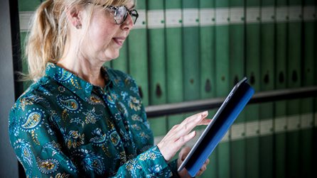Woman with a tablet in her hand